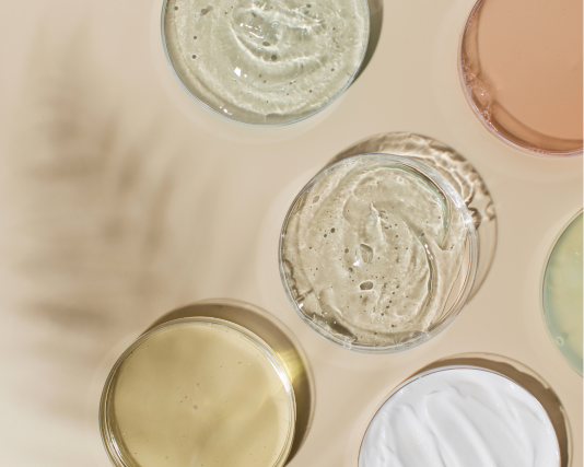 Petri dishes from birds view with different liquids