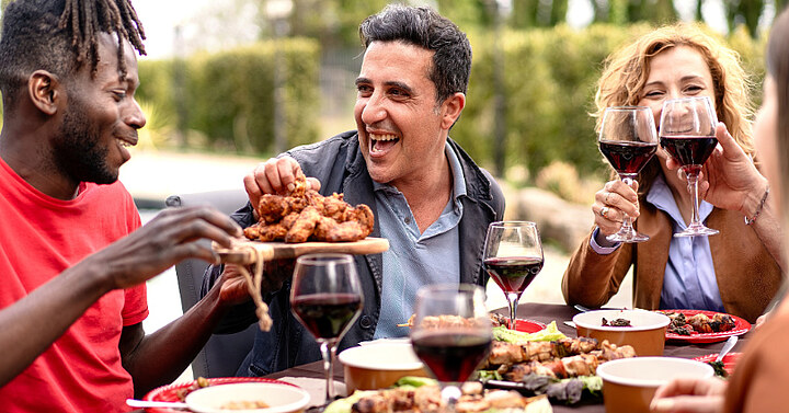 Celebrating the versatility of chicken Friends dining outside