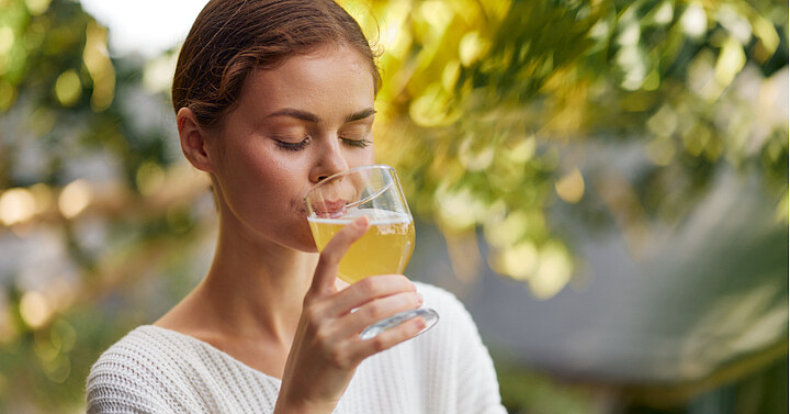 How gut health, hydration, and innovation converge Woman drinking water