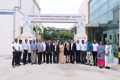 Symrise employees in front of the new cosmetic ingredient location in Chennai